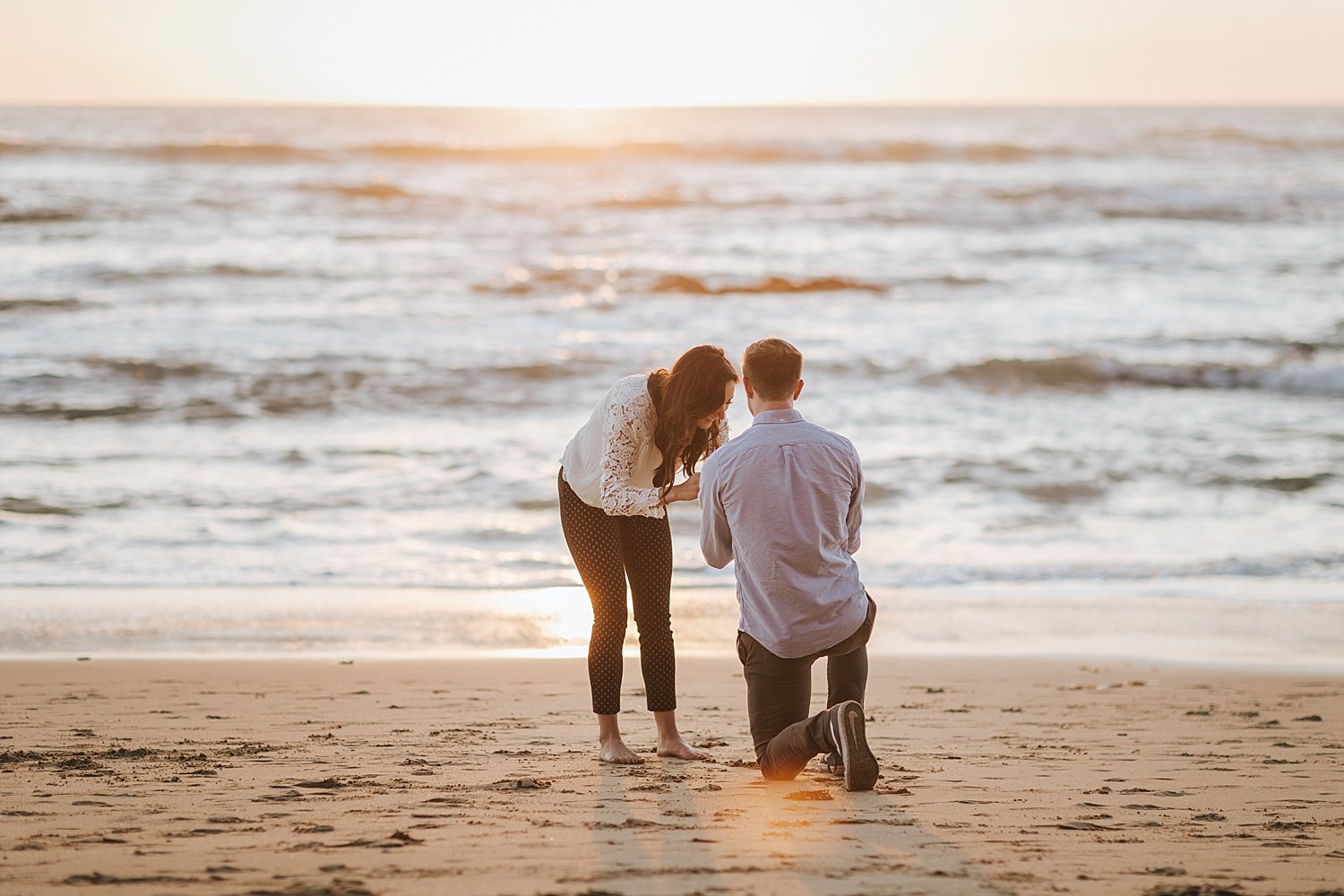 Sunset at Ritz Carlton Half Moon Bay is a perfect time to propose to your sweetheart. This beachy proposal and engagement shoot is so adorable and cute.