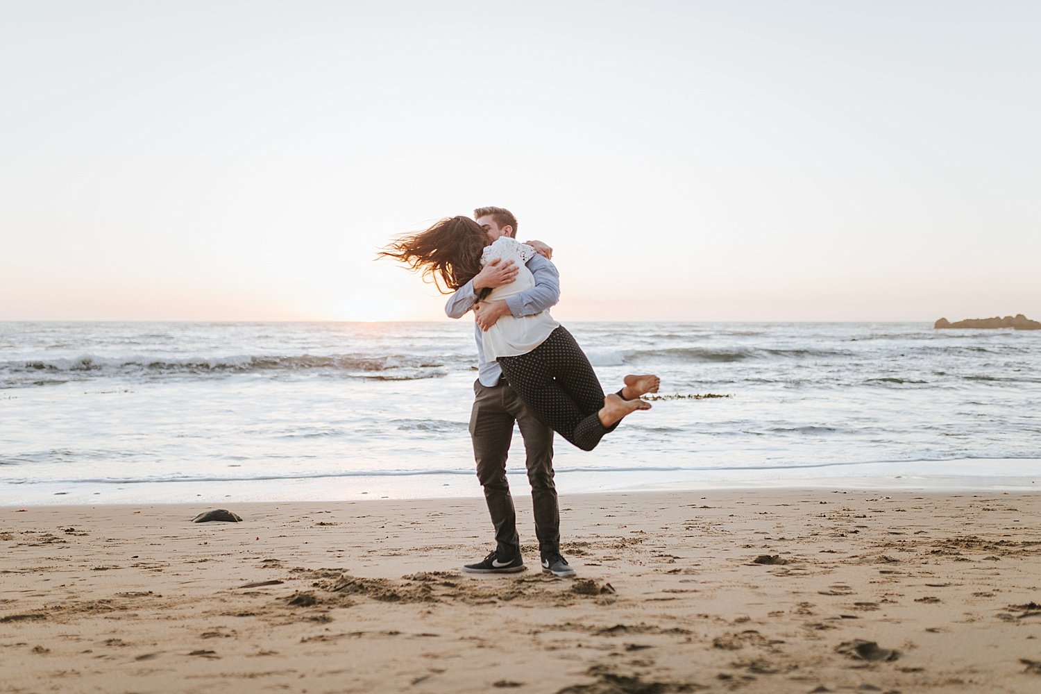Sunset at Ritz Carlton Half Moon Bay is a perfect time to propose to your sweetheart. This beachy proposal and engagement shoot is so adorable and cute.